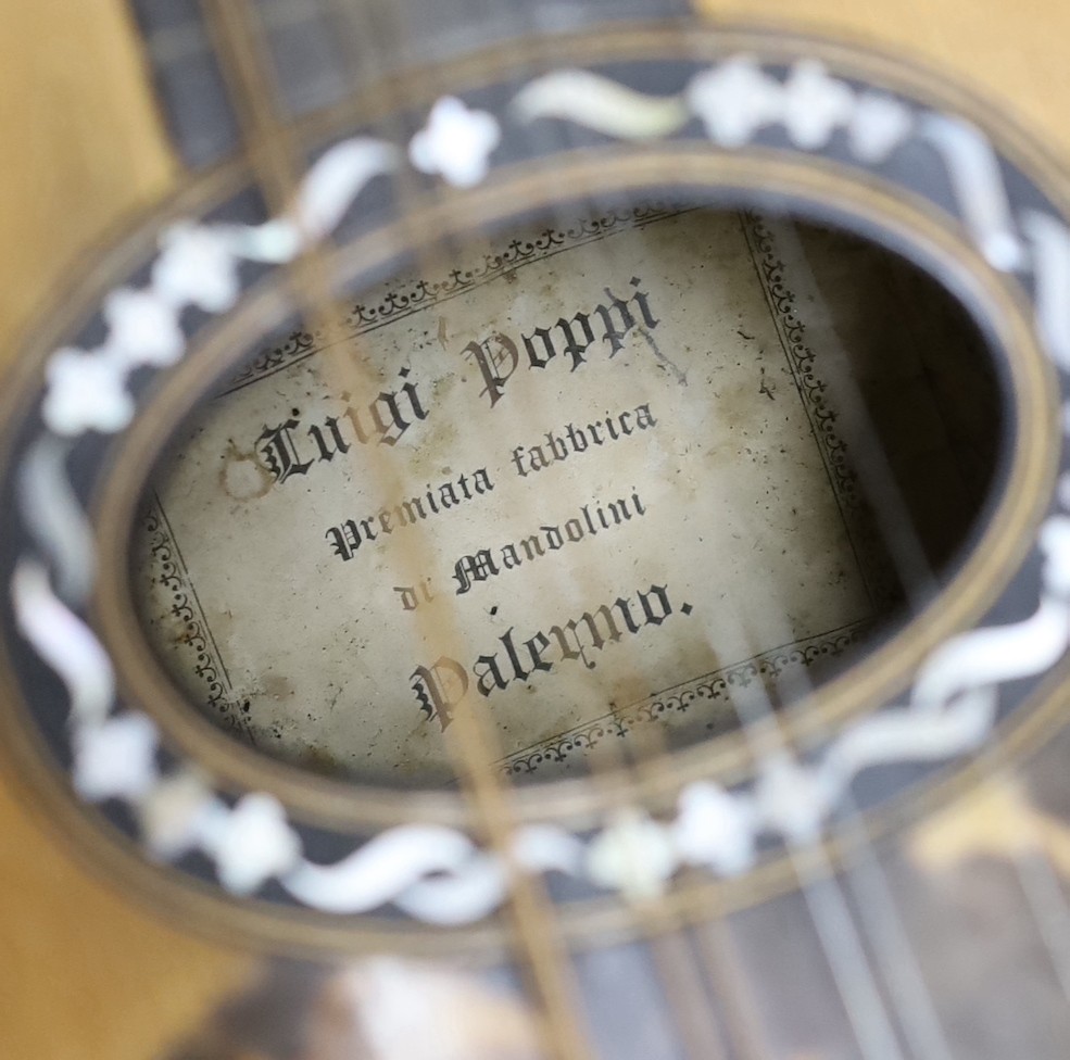 Two mandolins, with mother of pearl and tortoiseshell inlay, 57ms long, bone mounts
